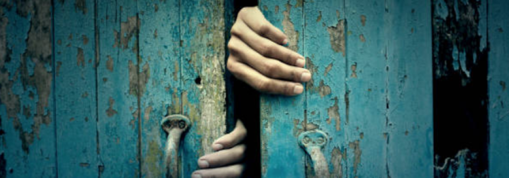 Hands Opening a Creepy Door